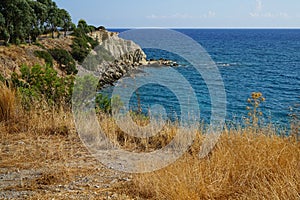 View of the Mediterranean coast in the vicinity of Pefki in August. Pefkos or Pefki, Rhodes Island, Greece