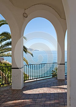 View of of MediterraneanSea through Arch photo