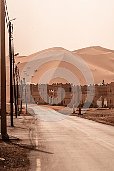 View of Merzouga and sand dunes, gateway to Sahara Desert, Merzouga, Morocco