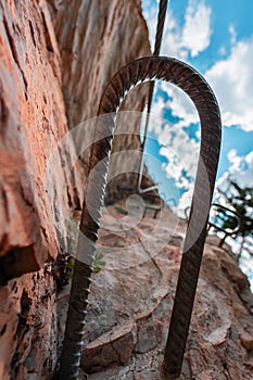 View Through a Metal Step on a Stone Wall