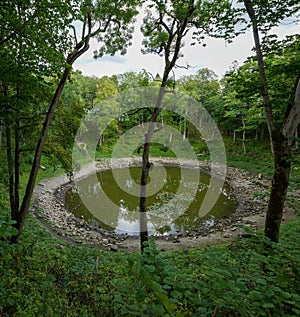 View of the meteor crater at Kaali Lake on Saaremaa Island in Estonia