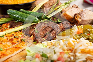 Mexican food platter, carne asada, pollo asado photo