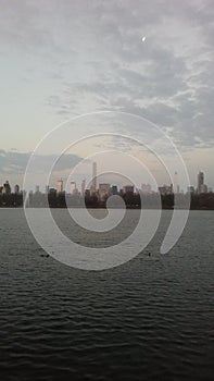 View of Midtown Manhattan Skyline from Central Park during Dawn on Easter Sunday in New York, NY.