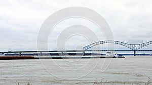 View of Mississippi River barge by Memphis, TN