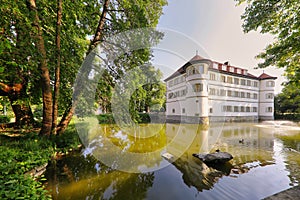 View of the Moated Castle surrounded with trees in Bad Rappenau, Germany