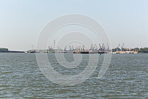 View on a modern industrial river- maritime port on the Danube river