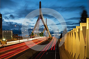 View of a modern motorway suspension bridge at dusk