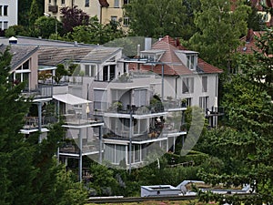 View of modern multi-family house located on a hill in town Esslingen am Neckar, Germany in an attractive residential district.