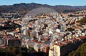 View of the modern part of the city against the background of mountains in Malaga, Andalusia region, Spain