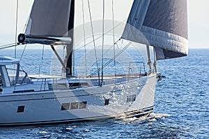 Modern sailing yacht in action photo