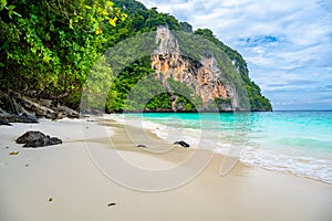 View of monkey beach at Ko Phi Phi islands, Thailand. Famous tropical beach with white sand and turquoise water. View from long
