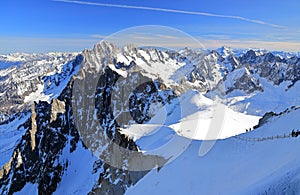 View of the Mont Blanc massif seen from the Aiguille du Midi. French Alps, Europe.