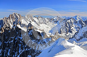 View of the Mont Blanc massif seen from the Aiguille du Midi. French Alps, Europe.