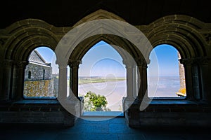 View of Mont Saint-Michel Bay from Abbey Window on a Sunny Summer Day in Normandy France photo