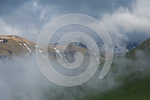 View of the Monti SIbillini national park with fog in the spring season, Marche region, Italy