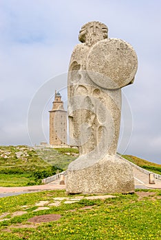 View at the Monument of Celtic King Breogan with Hercules Tower in the background in A Coruna - Spain photo