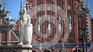 View of a monument to Roland at Town Hall Square against the background House of the Blackheads of Riga Latvia