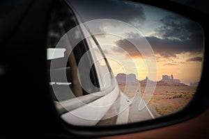 View on Monument Valley, Utah, from car mirror at Forrest Gump point