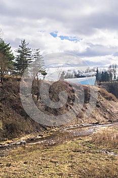 View of the monument Warplane MIG-17 and Holinka river valley in early spring. Rzhev, Tver region. photo