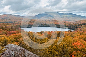 View of Moosehead lake with early fall foliage. Maine, United States.