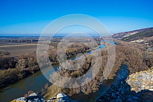 View of the Morava river in the autumn forests near the city of Bratislava