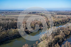 View of the Morava river in the autumn forests near the city of Bratislava photo