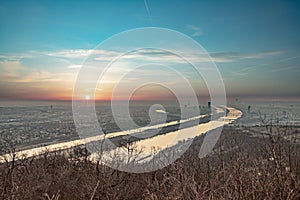 View in morning light to Vienna with river Danube