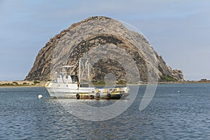 View on the Morro rock with ship in foreground photo
