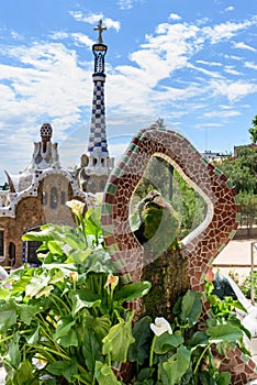 View from the mosaic fountain on Antoni Gaudi Trident Tower in Park Guell. Barcelona, Spain photo