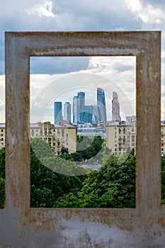 View Moscow City through the rusty frame.