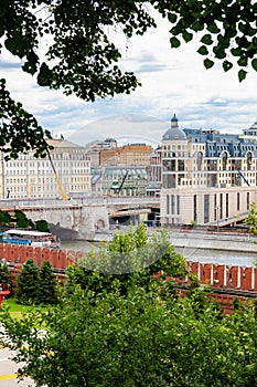 View from the Moscow Kremlin to the embankment of Moscow River, Bolshoy Moskvoretsky Bridge under restoration and the Central