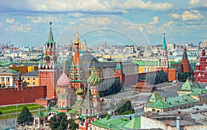 View on Moscow Red Square, Kremlin towers, Clock Kuranti, Saint Basil`s Cathedral church, Lenin mausoleum. Panorama Hotel Russia.