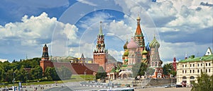 View on Moscow Red Square, Kremlin towers, stars and Clock Kuranti, Saint Basil`s Cathedral church. Hotel Russia Moscow Red Square