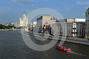 View of the Moscow river and Raushskaya embankment from Moskvoretsky bridge in Moscow.