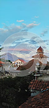 view of the mosque and cloudy sky in the afternoon