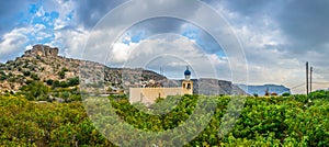 View of a mosque hidden behind trees on the saiq plateau at the jebel akhdar mountain in Oman