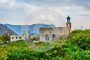 View of a mosque hidden behind trees on the saiq plateau at the jebel akhdar mountain in Oman....IMAGE