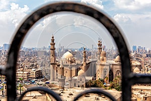 View on the Mosque-madrasa of Sultan Hassan through the old gate of the Citadel in Cairo photo