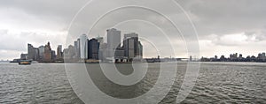 View of the most emblematic buildings and skyscrapers of Manhattan (New York). Skyline from the Staten Island ferry