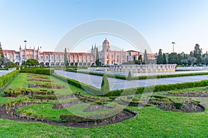 View of mosteiro dos Jeronimos through praca do imperio in Belem photo