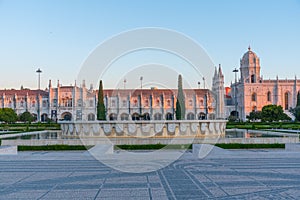 View of mosteiro dos Jeronimos through praca do imperio in Belem photo