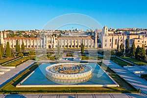 View of mosteiro dos Jeronimos through praca do imperio in Belem photo