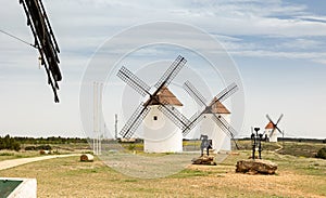 View of Mota del Cuervo with windmills and iron statues of Don Quixote and Sancho Panza