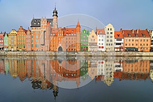 View of Mottlau River Long Bridge Dlugie Pobrzeze waterfont with Brama Mariacka Frauentor, Gdansk Danzig, Poland.