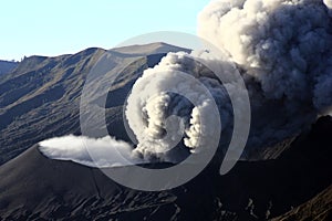 The view of Mount Bromo being erupted in the morning