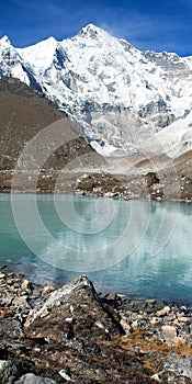 View mount Cho Oyu mirroring in lake - Cho Oyu base camp - Everest trek - Nepal Himalayas mountains