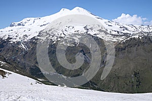 View of Mount Elbrus from Mount Chegeth on a sunny June day. Kabardino-Balkaria