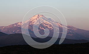 View of the Mount Erciyes in Kayseri. Dark shapes in sunset photo