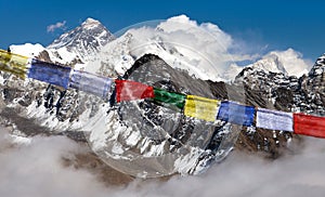 Mount Everest and Lhotse with buddhist prayer flags