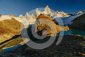 View of Mount Fitz Roy and the lake in the National Park Los Glaciares National Park at sunrise. Autumn in Patagonia